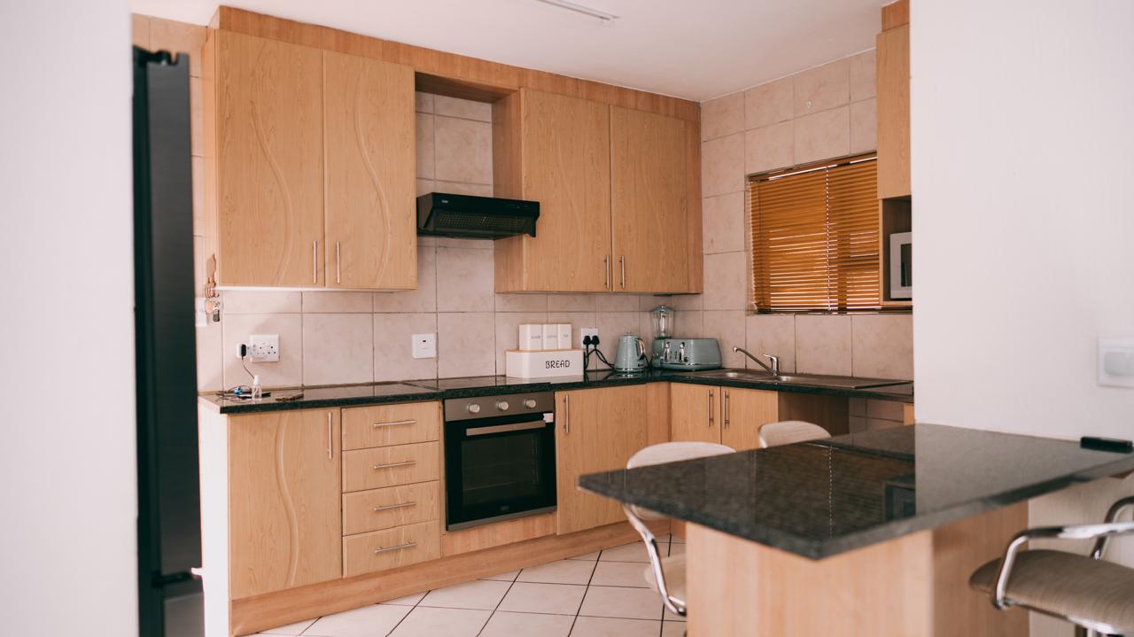 Le Voila fully equipped kitchen with granite breakfast bar